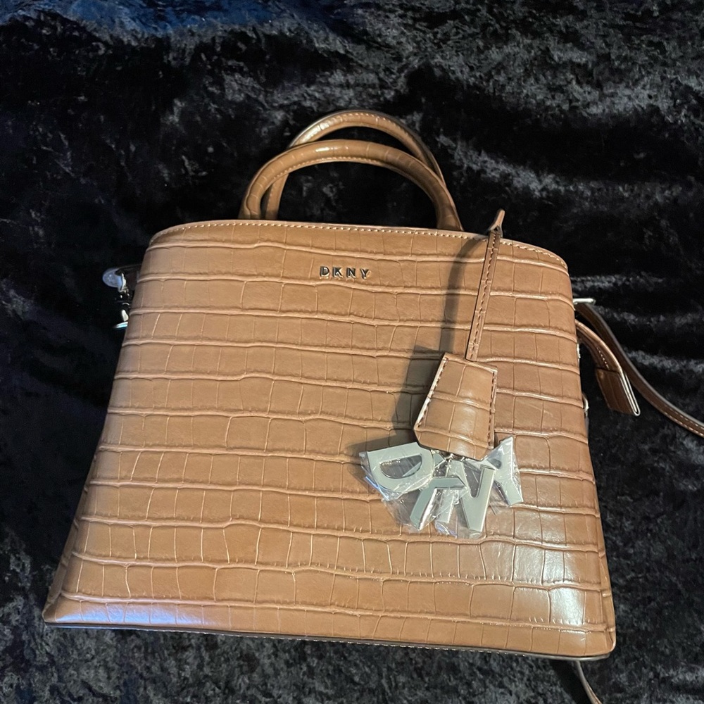 DKNY hand bag:  New w/tags.  Never been used.